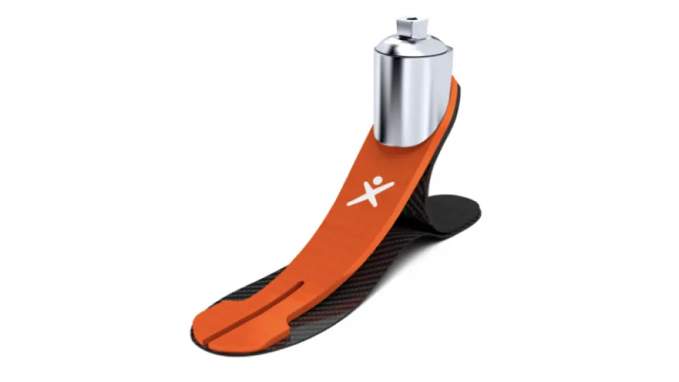 Prosthetic foot with orange and black design, metallic attachment